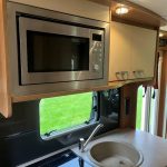 2013 Swift Sundance 582 PR - motorhome for sale - kitchen area & microwave